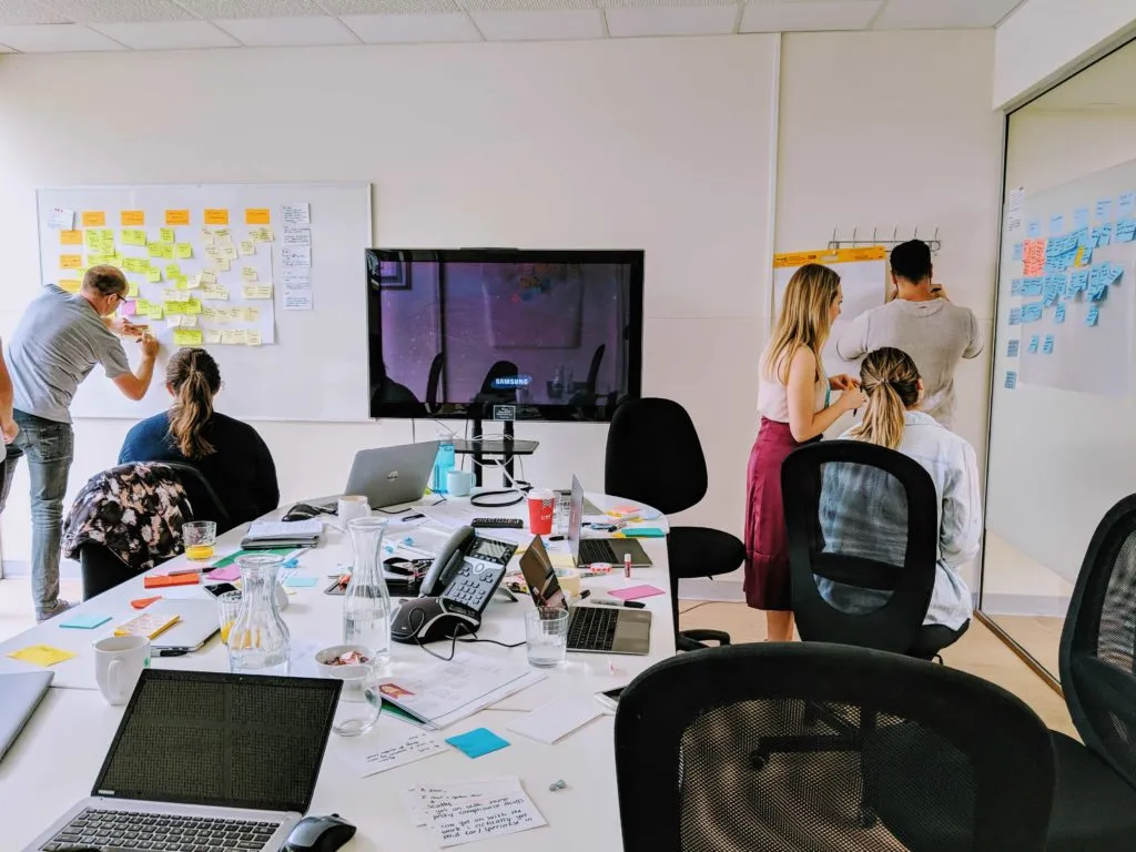 Atomix team working collaboratively with clients